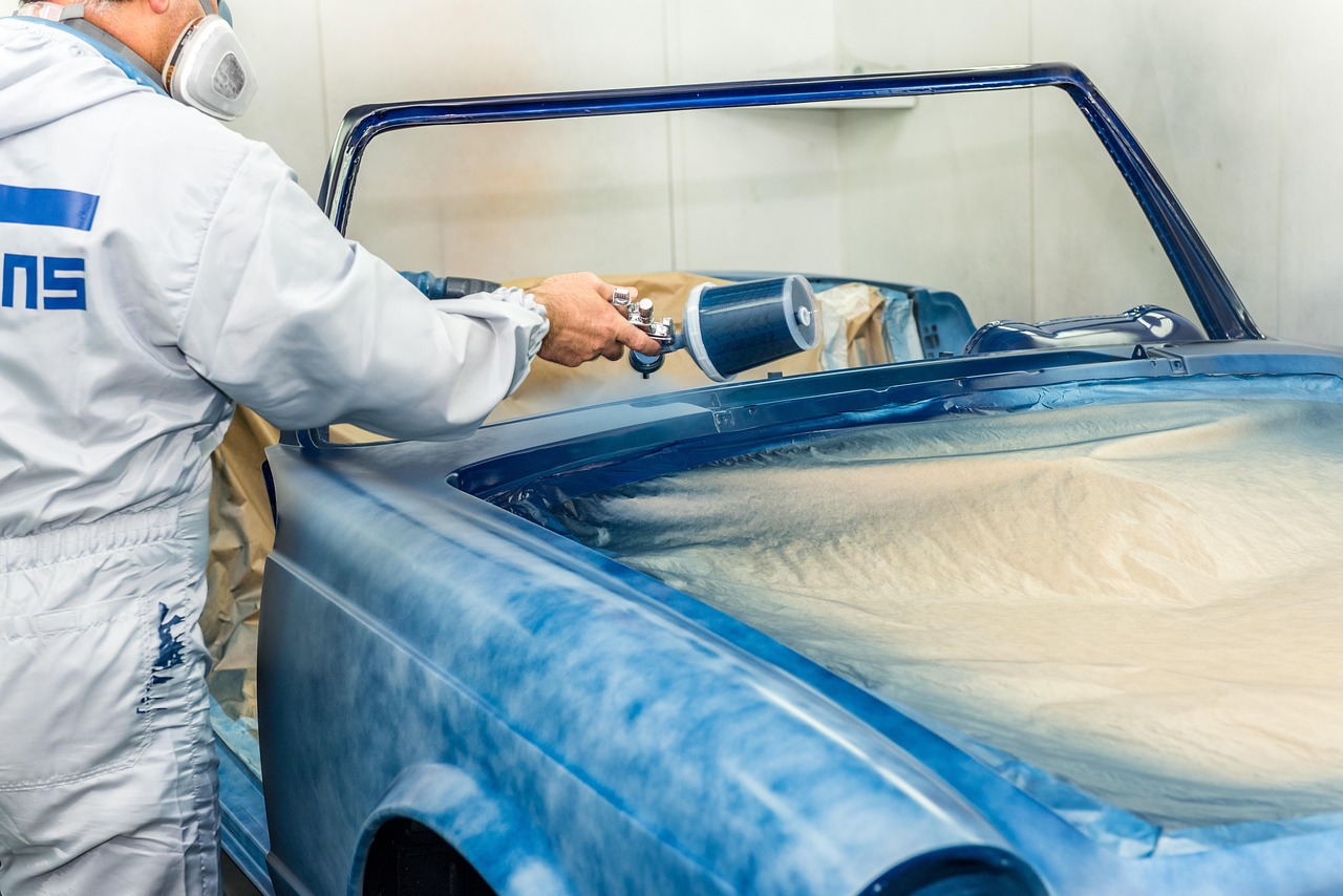 Professional paint correction and buffing process on car exterior